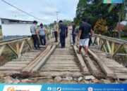 Polsek Wonosari Kerja Bakti Bersama Warga, Perbaiki Jembatan Penghubung Desa Mekar Jaya